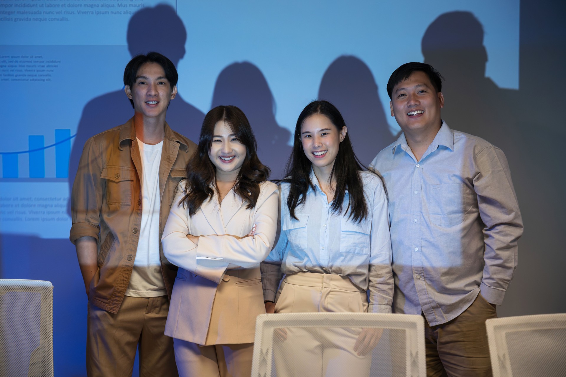 Portrait of business team. Creative Startup Young business people in late-night project meeting in a modern office.